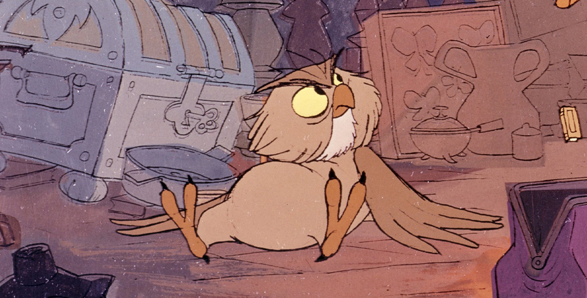 In the animated film The Sword and the Stone, the owl Archimedes lays on the ground as though he has fallen. He has brown feathers and pale yellow eyes, which glare up at something off-screen. Chests, pans, and an odd assortment of knick-knacks surround him.
