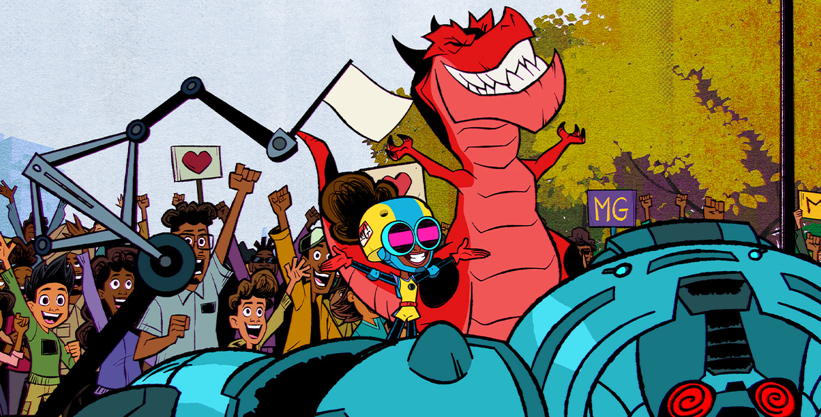 In a scene from Marvel’s Moon Girl and Devil Dinosaur, Lunella, a young girl, celebrates with Devil Dinosaur, a large, red T-Rex in front of a crowd of people. Lunella wears a yellow and teal helmet, a yellow jumpsuit, and teal elbow pads and knee pads. The crowd waves flags and hold signs reading “MG”.