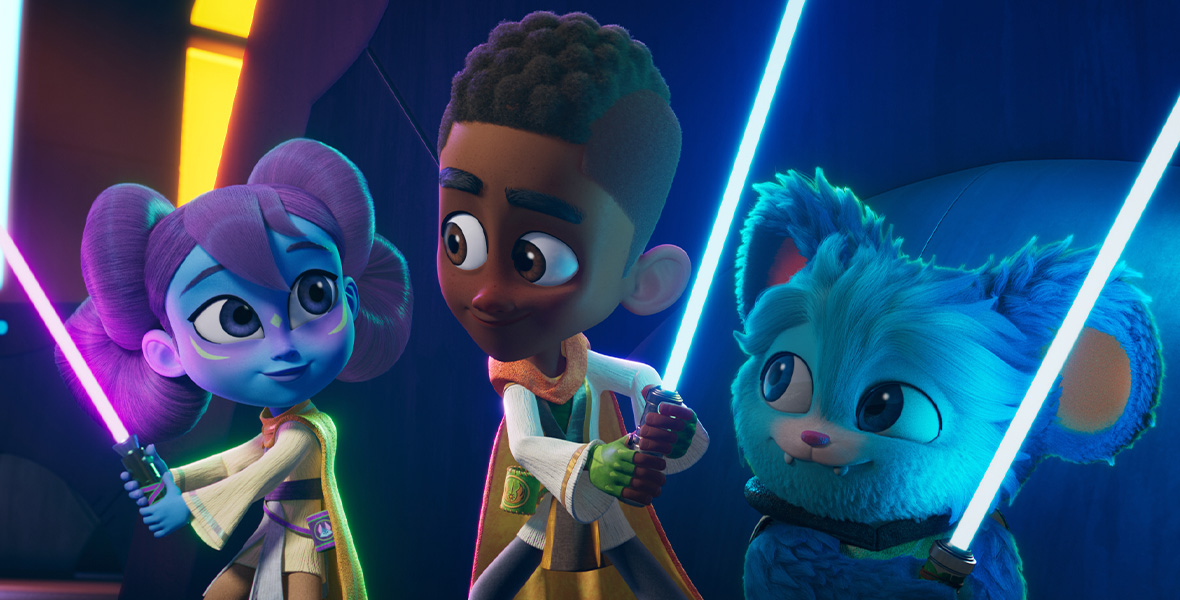 An image from Lucasfilm’s Star Wars: Young Jedi Adventures. From left to right, Lys, Kai, and Nubs are seen holding lightsabers during a training sequence.