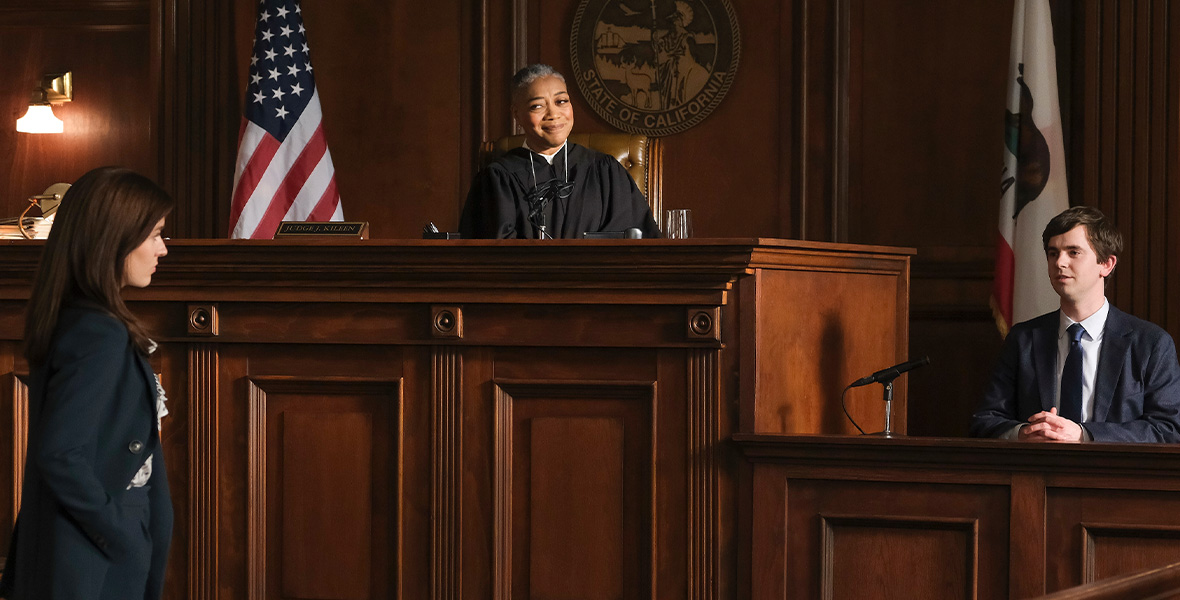 In a scene from an episode of The Good Doctor actor Kennedy McMann cross-examines actor Freddie Highmore in a courtroom.