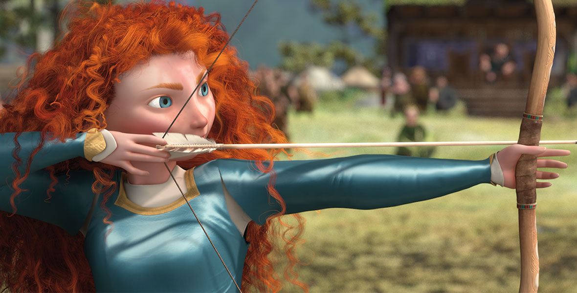 In the animated film Brave, Merida aims her arrow against her bow as she prepares to shoot. Her curly red hair is loose and her teal dress has been torn at the seams so she can shoot comfortably. Members of the clans look on as she shoots.