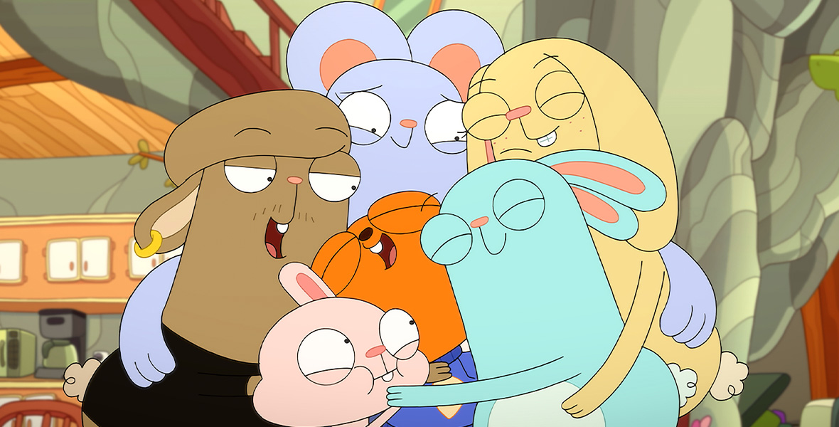 In a scene from an episode of Kiff, an animated brown squirrel named Kiff is hugged by five colorful animals inside a house.