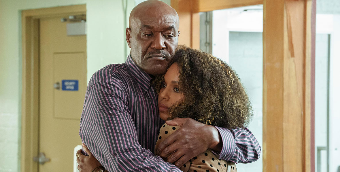 In a scene from an episode of UnPrisoned, actors Kerry Washington and Delroy Lindo hug.