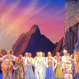 The entire casts of The Lion King and Frozen stand on stage before taking their final bow for delighted audiences.