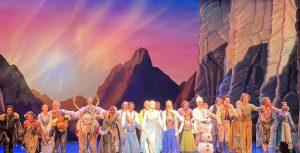 The entire casts of The Lion King and Frozen stand on stage before taking their final bow for delighted audiences.