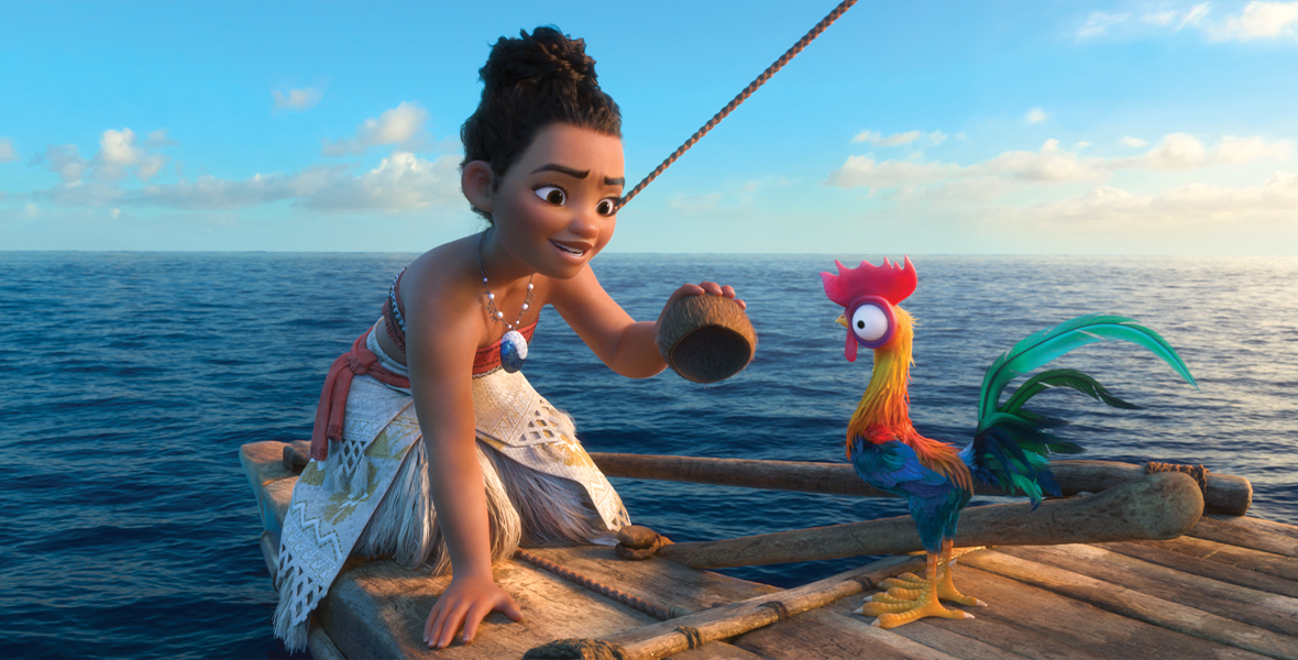 In a scene from Moana, Moana and a rooster named Hei Hei are on a raft in the ocean on a sunny day. Moana kneels on all fours and holds a coconut in one hand.