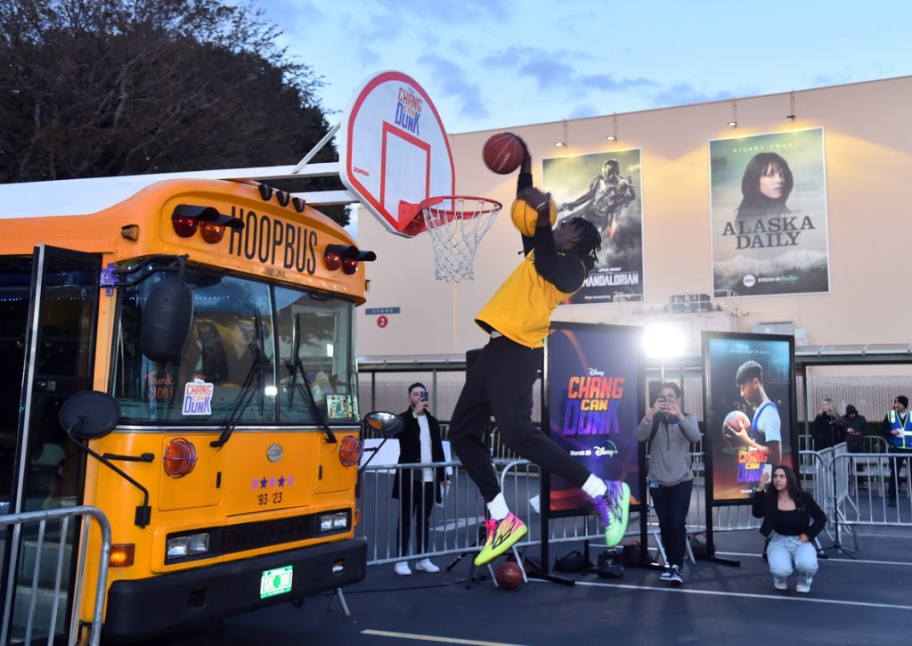 BURBANK, CALIFORNIA - MARCH 06: Players slam dunk during the Launch &amp; Screening Event for Disney's “Chang Can Dunk” at Walt Disney Studios in Hollywood, California on March 06, 2023. (Photo by Alberto E. Rodriguez/Getty Images for Disney)