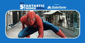 In a scene from Spider-Man 2, Spider-Man poses on top of a subway car.