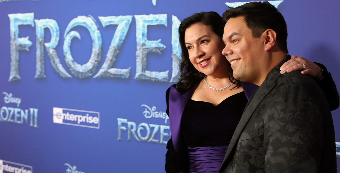 Kristen Anderson-Lopez and Robert Lopez pose at the Frozen 2 premiere.