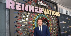 Jeremy Renner poses for photographers at the Rennervations premiere.