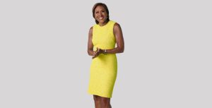 Robin Roberts wears a yellow shift dress and a rainbow Apple Watch.