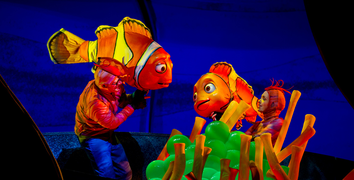 In the Finding Nemo stage show, two performers control larger-than-life puppets of Marlin and Nemo, the father-and-son clownfish. They speak to each other just above a prop of their home, a sea anemone.
