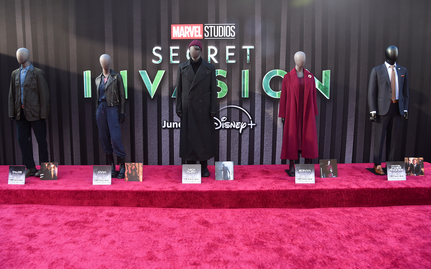 From left to right: Costumes for Talos, G’iah, Nick Fury, Sonya Flasworth, and Colonel James Rhodes were on display at the Secret Invasion launch event in Hollywood.