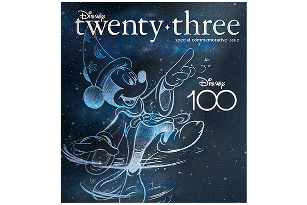 A white and transparent sketch of Mickey shows him in his Fantasia outfit including a robe, a wizard&rsquo;s hat that features 2 stars and a moon, and slouchy shoes. Mickey is pointing up to the right hand corner of the page with his right foot off the ground and spirals sketched going around him. He is atop a blue galaxy background with &ldquo;Disney twenty-three special commemorative issue&rdquo; written at the of the page and &ldquo;Disney 100&rdquo; written on the far right of the page.