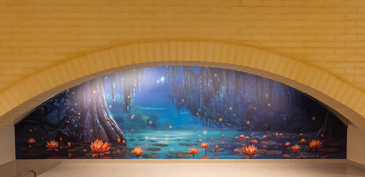 A mural inside Tiana’s Palace depicts the blue bayou from the film The Princess and the Frog.