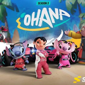 Gantu, Stitch, Lilo, Angel, and Jumba stand in front of two red race cars, all wearing racing suits
