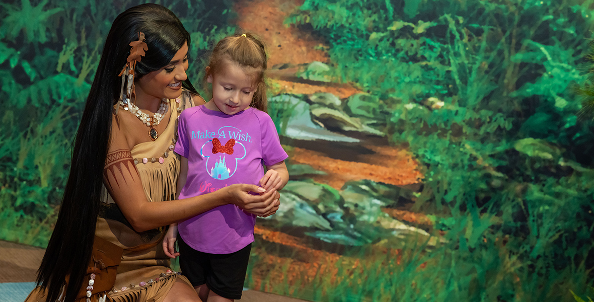 Pocahontas hugs a Make-A-Wish kid at Walt Disney World Resort.