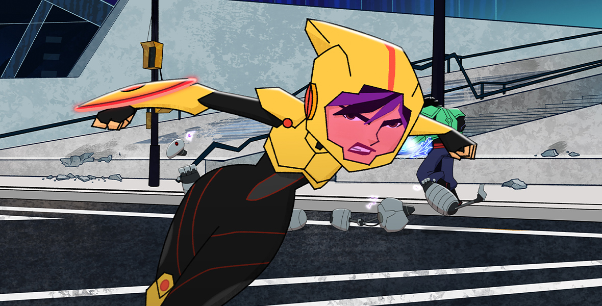 GoGo Tomago, from Big Hero 6: The Series, is in her yellow super armor with an angry look on her face as she runs forward. There is a person behind her with green upper body armor on, blue pants, and a gray cylinder at the end of his leg.