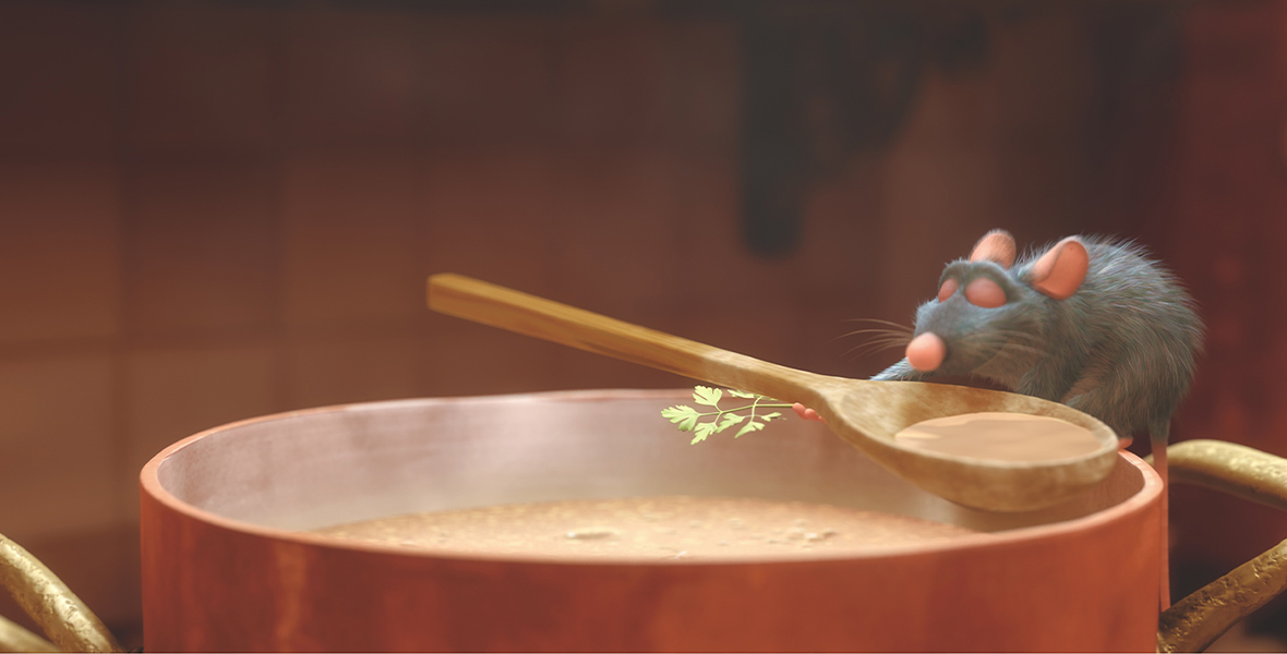 In an image from Disney and Pixar’s Ratatouille, Remi (voiced by Patton Oswalt) is standing on the edge of a large soup pot, holding up a wooden spoon and smelling its contents; his eyes are closed, and he has a pleased look on his face. He’s also holding a sprig of parsley in his left hand.