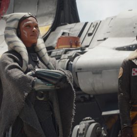 Ahsoka Tano (Rosario Dawson) and Hera Syndulla (Mary Elizabeth Winstead) stand in front of the ship Ghost.