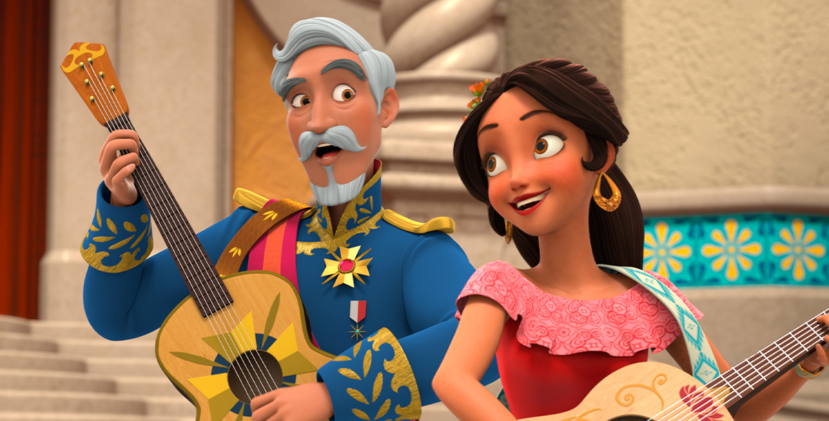 In an image from Disney’s Elena of Avalor, Francisco (voiced by Emiliano Díez), left, and Elena (voiced by Aimee Carrero), right, are both playing guitars and singing. Francisco is in a blue uniform jacket with gold brocade, and Elena is wearing her signature red dress.