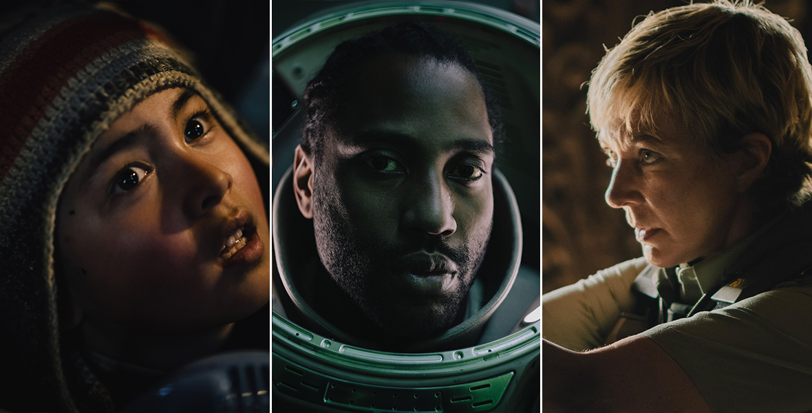 right: Madeleine Yuna Voyles is seen in close-up as the AI girl Alphie, who is seen wearing a Tibetan-style knit cap with ear flaps; John David Washington is seen in close-up as Joshua, who is wearing the helmet of a spacesuit; and Allison Janney is seen from her left side as Colonel Jean Howell, who is wearing a military jumpsuit and pointing a large weapon at something out of frame.
