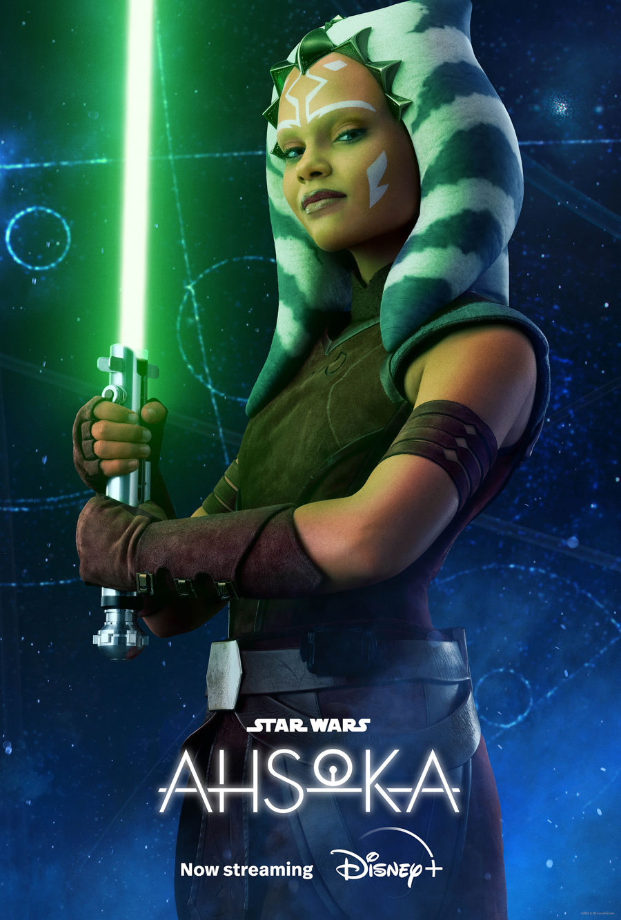 Young Ahsoka Tano from Ahsoka played by Ariana Greenblat is holding a green lightsaber while standing in front of a blue galaxy background. Star Wars Ahsoka is written in white on the bottom with now streaming written beneath that with the Disney plus logo written beside now streaming.