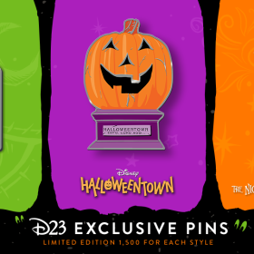Artwork featuring D23-exclusive pins celebrating Hocus Pocus’ 30th anniversary, Halloweentown’ 25th anniversary, and Tim Burton’s The Nightmare Before Christmas’ 30th anniversary.