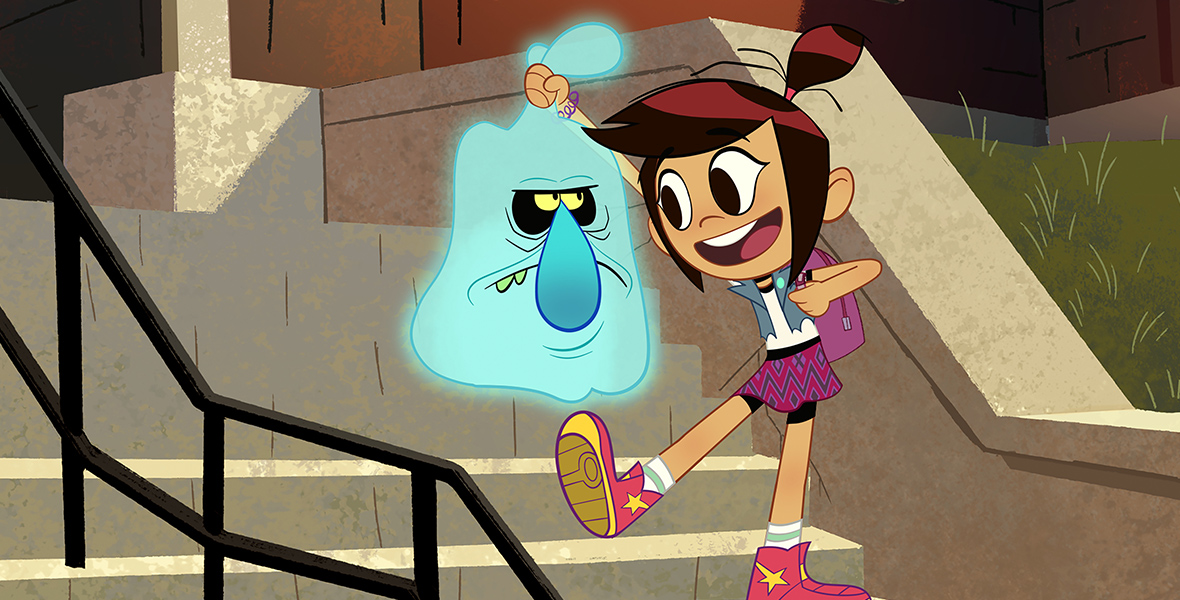 In an image from Disney Branded Television’s The Ghost and Molly McGee, Molly (voiced by Ashly Burch) is seen holding Scratch (voiced by Dana Snyder) on the steps of her school. She’s wearing a jean vest, a pink plaid skirt, and pink high-tops and is carrying a backpack.