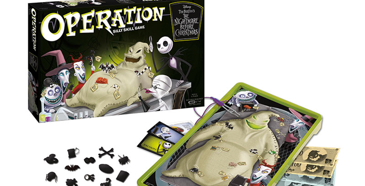 An image of Operation: Disney The Nightmare Before Christmas—both the box of the game and the game itself, with Oogie Boogie as the patient and the custom “Funatomy” parts that players will remove from the patient during gameplay. The cover of the box depicts Oogie Boogie on an operating table surrounded by Lock, Stock, and Barrel, as well as Jack Skellington and Doctor Finkelstein.