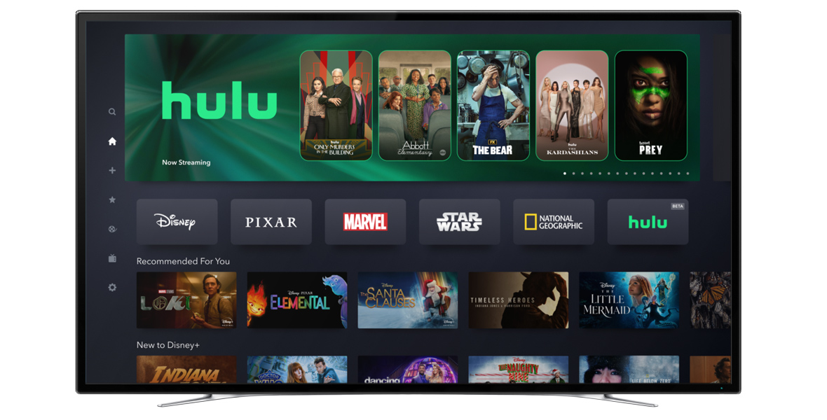 Screenshot of the Hulu tile within the Disney+ app interface, showing alongside other category tiles such as Disney, Pixar, Marvel, Star Wars, and National Geographic. The Hulu section displays a selection of streaming options including 'Only Murders in the Building,' 'Abbott Elementary,' 'The Bear,' 'The Kardashians,' and 'Prey.' Below, the Disney+ interface shows recommended titles and new additions like 'Loki' and 'The Little Mermaid,' indicating an integrated streaming experience where users can access content from both platforms in one place.