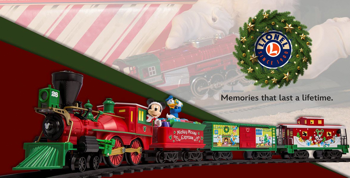 A full Lionel train is seen with Mickey Mouse as conductor and Donald Duck close by. The train is green and red with cheerful holiday scenes and a few Hidden Mickeys. The Lionel logo set amid a gold-festooned wreath is at top right with the tagline “Memories that last a lifetime.”