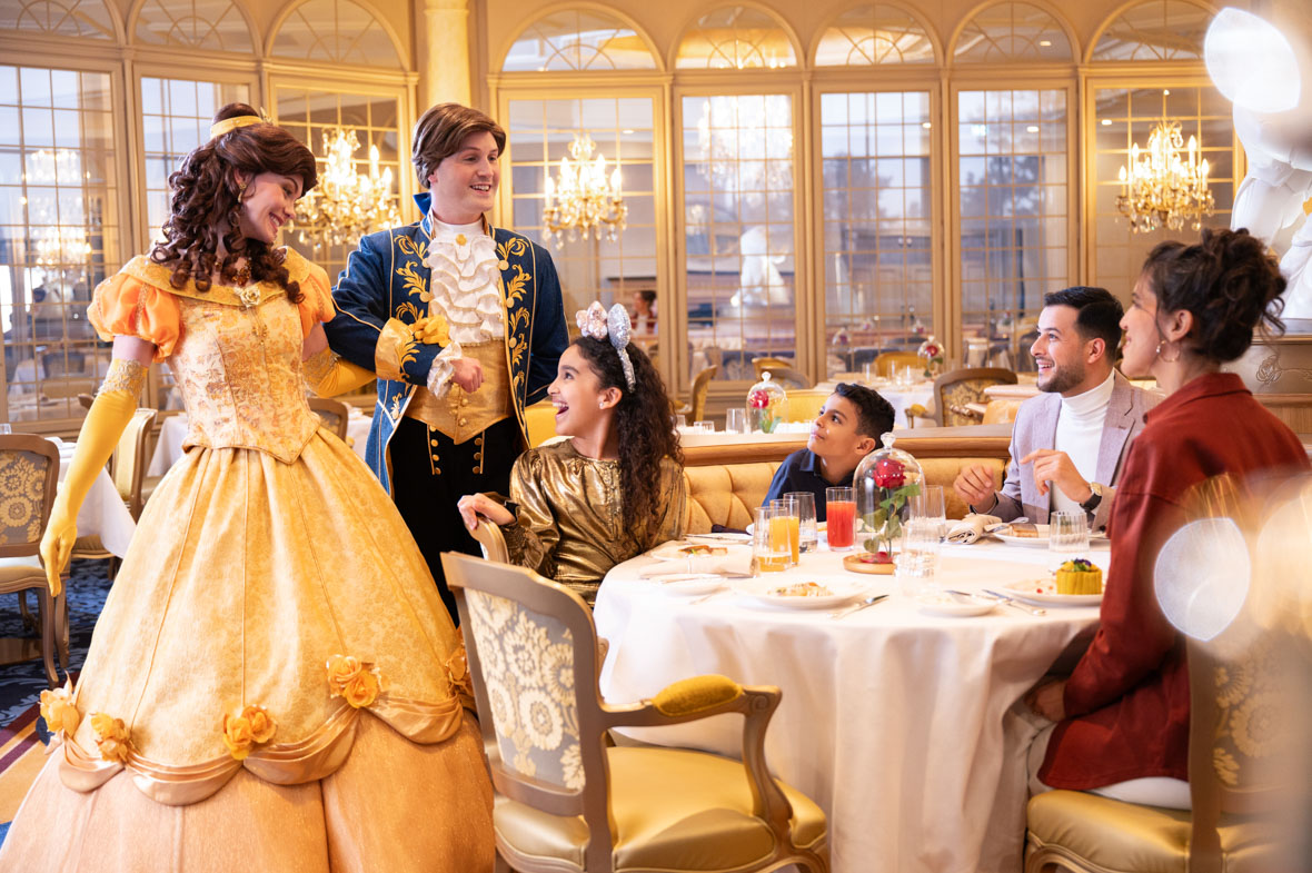 Belle and The Beast greet guests at La Table de Lumière restaurant.