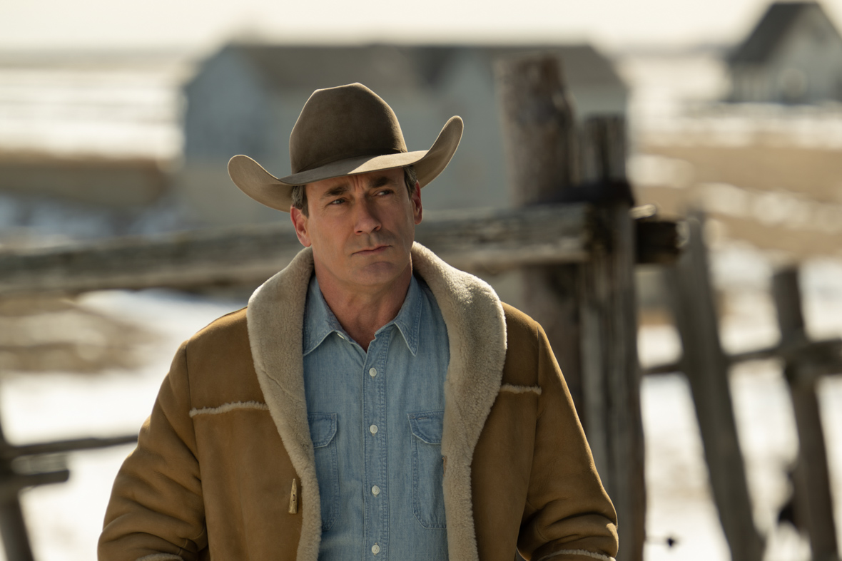 In a scene from Season 5 of FX’s Fargo, corrupt preacher and rancher Roy Tillman, played by Jon Hamm, wears a cowboy hat, a sherpa-lined leather jacket, and a denim shirt.