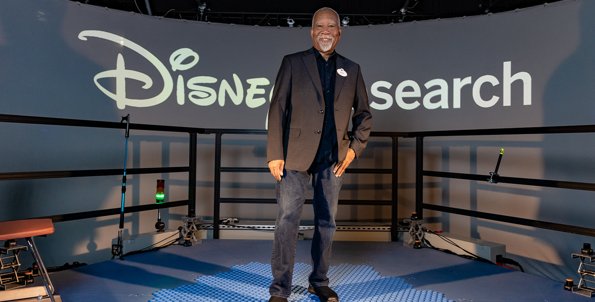 Imagineer Lanny Smoot stands on the HoloTile floor in the Disney Research lab.