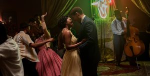 Evelyn, played by Mallori Johnson, and Malcolm X, played by Aaron Pierre, dance at a jazz club in National Geographic's GENIUS: MLK/X.