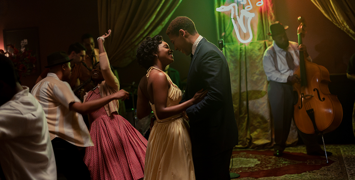 Evelyn, played by Mallori Johnson, and Malcolm X, played by Aaron Pierre, dance at a jazz club in National Geographic's GENIUS: MLK/X.