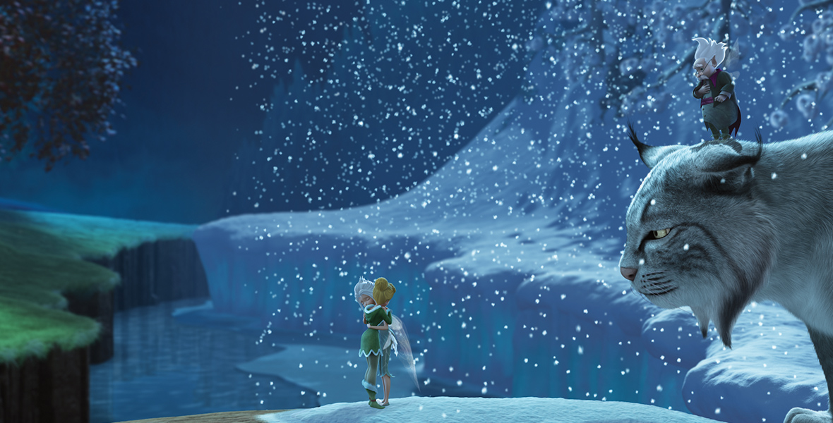 The fairies Tinker Bell and Periwinkle are embracing amidst falling snow in this image from the movie Secret of the Wings. Fiona, a pet lynx who towers over the tiny fairies, gazes at them from the right side of the photo, while Fiona’s keeper, the gray-haired pixie Dewey, stands atop Fiona’s head, also observing the tender embrace between the two fairies.