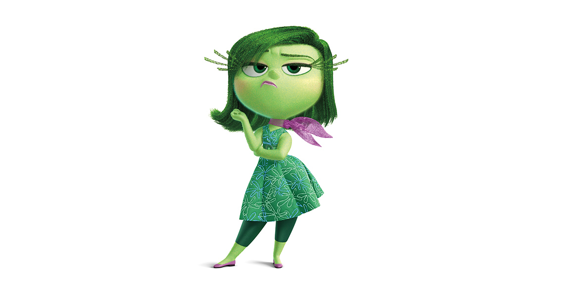 Disgust from the movie Inside Out is entirely green and has a sassy expression. She has medium-length green hair and is wearing a fuchsia, skinny shawl tied around her neck, a green sun dress with green leggings under, and fuchsia ballet flats.
