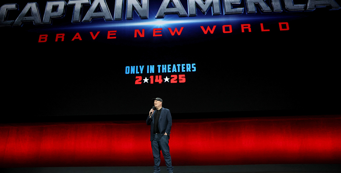 Kevin Feige, President, Marvel Studios, speaks onstage during the Walt Disney Studios presentation at Cinemacon. Onscreen behind him is the logo for the film Captain America: Brave New World, along with the text “Only in theaters 2-14-25