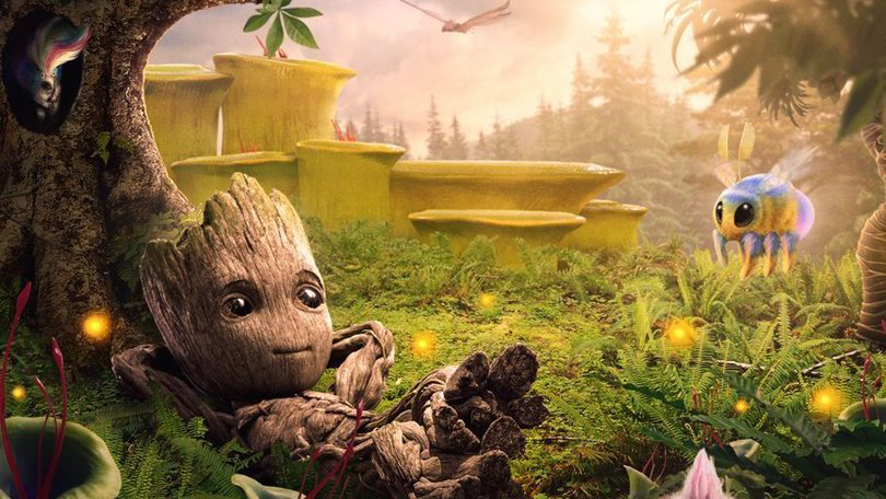 In a still from Disney+’s I Am Groot series, Baby Groot sits in a forest surrounded by plants and a bug creature.