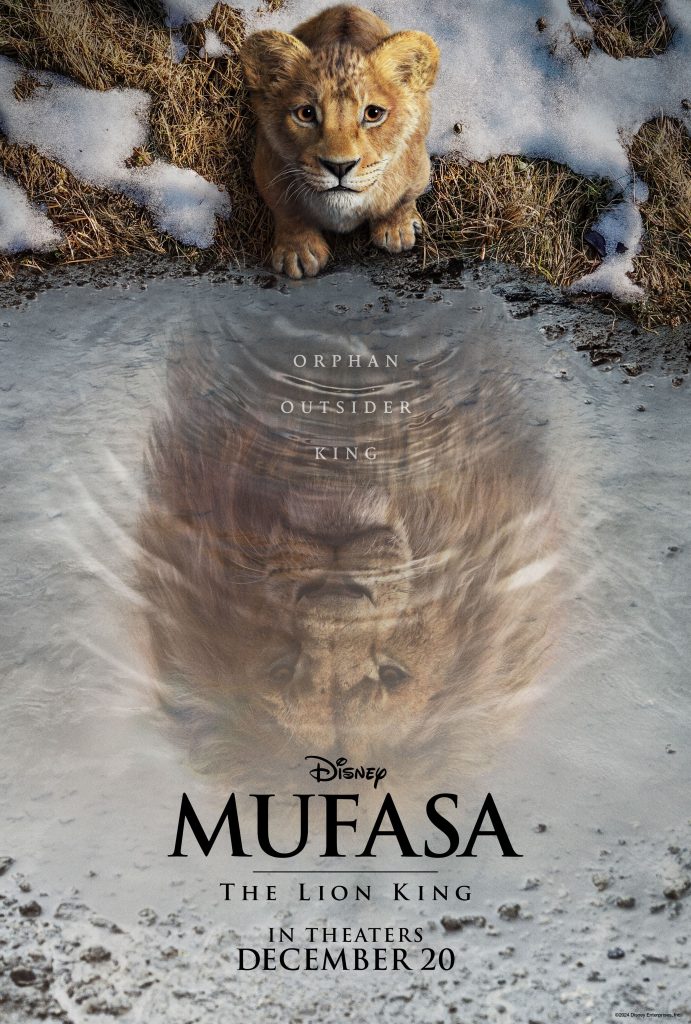 The official poster for Mufasa: The Lion King shows a young lion cub at the edge of a watering hole, facing the camera. Reflected in the water is the countenance of an adult male lion with the words: “Disney Mufasa The Lion King” at center, and “In Theaters December 20” below.