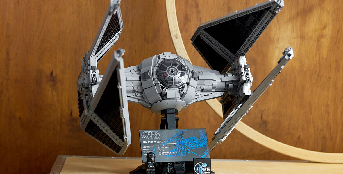 Built LEGO Star Wars TIE Interceptor set on table.