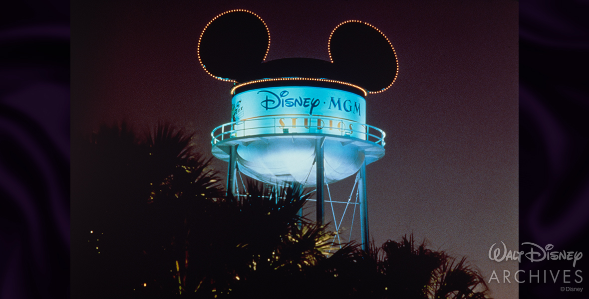 A nighttime view of the Earfful Tower shimmering over Disney’s Hollywood Studios.