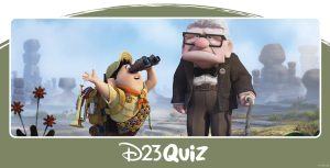 In a scene from Up, Russell (left), voiced by Jordan Nagai, and Carl (right), voiced by Edward Asner, are standing on terrain with flattened, large rocks. Russell, a Senior Wilderness Explorer, is wearing a Boy Scout uniform: a yellow shirt, brown shorts, a yellow cap, white crew socks, brown hiking shoes, and a yellow backpack containing a trumpet, a sleeping bag, and other hiking tools. Around his neck is an orange scarf, and diagonally across his shirt are the many badges Russell has earned as a Wilderness Explorer. He is looking at the sky through a pair of black binoculars. Carl is wearing a white shirt, a black bow tie, and a brown wool suit, a belt, pants, and loafers. He wears black, square glasses and holds a metallic cane with his left arm, which has four tennis balls on its end. In the background of the photo is the sky, clouds, and rock formations, with plants peeking out from beneath the rocky terrain.