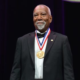 Disney Imagineer Lanny Smoot appears onstage at the National Inventors Hall of Fame awards ceremony in Washington, D.C.