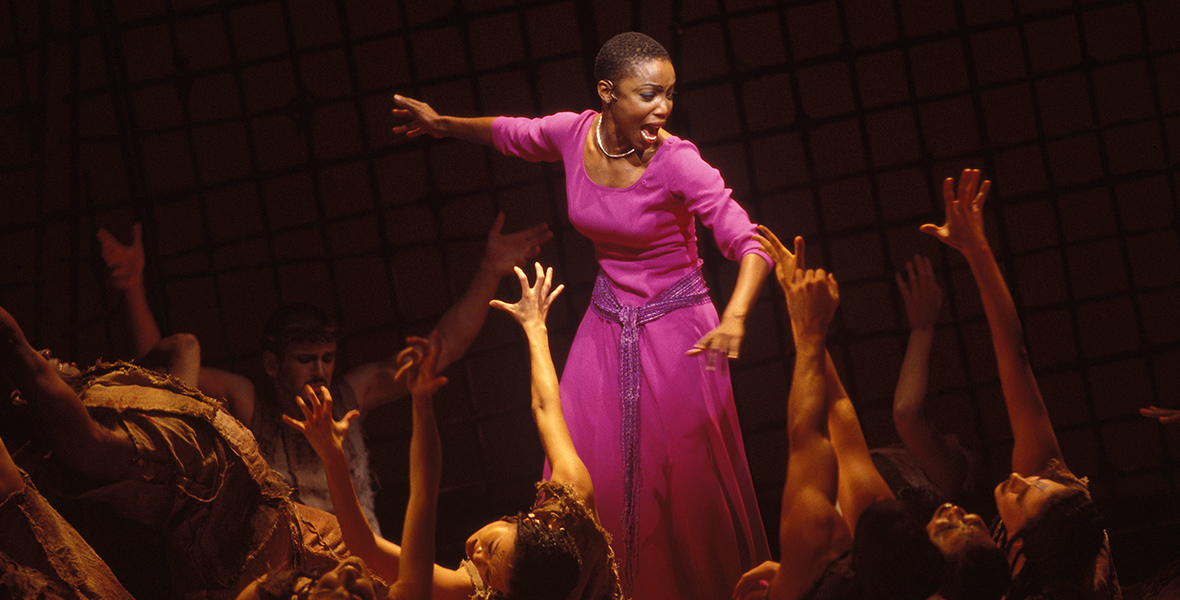 Heather Headley and cast perform in Aida.