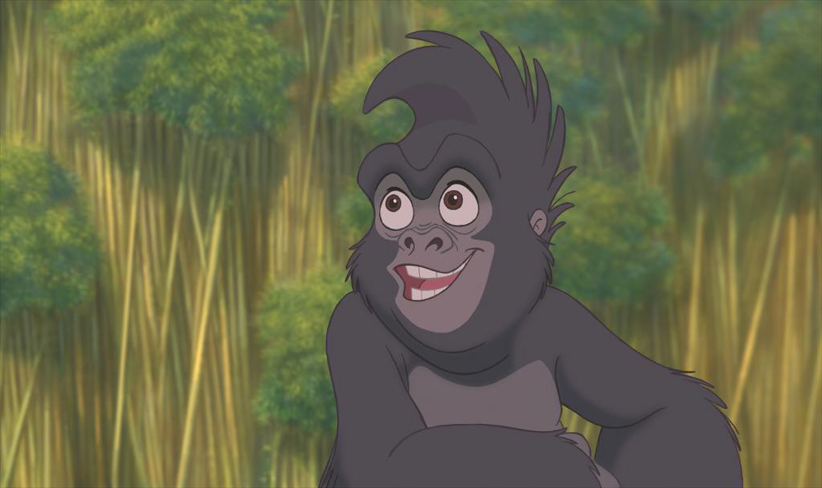 With trees in the background, Terk, from Tarzan, is smiling.