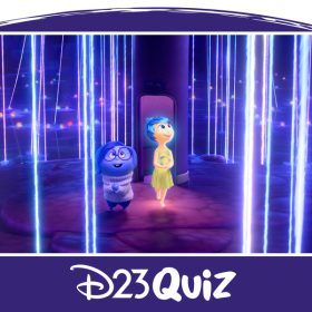 In a scene from Inside Out 2, Sadness (voiced by Phyllis Smith) and Joy (voiced by Amy Poehler) are standing on a dark blue island, surrounded by dark blue water. Neon-colored spheres with neon rays extending upward are scattered around the island and in the water. Behind Joy is a purple cylinder with a door-sized opening at its base. Both Joy and Sadness look upwards, amazed.