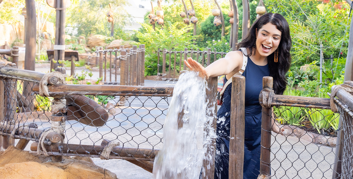 Auli'i Cravalho plays with water at Journey of Water, Inspired by Moana, at EPCOT
